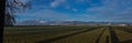 Panorama of Kamnik alps taken from far, from Menges fields in the vicinity of Domzale on a sunny day