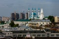 Panorama of Kazan and the concept of contrast between the new and the old city. Mosque against the background of new buildings Royalty Free Stock Photo