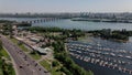 View of the city of Kiev across the Dnieper River, with a long bridge in the foreground. The bridge over the Dnieper