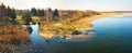 Panorama of lake in forest at morning time. Clean rural environment background
