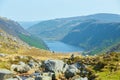 Panorama of Lake Lough Tay or The Guinness Lake. County Wicklow, Wicklow Mountains National Park, Ireland. Royalty Free Stock Photo