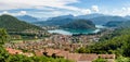 Panorama of lake Lugano and Lavena Ponte Tresa town, Italy Royalty Free Stock Photo