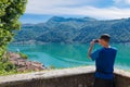 Panorama of Lake Lugano in Morcote, Switzerland, and tourist
