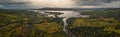 Panorama landscape along Wildernes Road with lake and forest in autumn in Lapland in Sweden from above Royalty Free Stock Photo