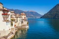 Panorama landscape on beatiful Lake Como in Brienno, Lombardy, Italy. Scenic small town with traditional houses and clear blue