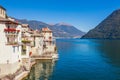 Panorama landscape on beatiful Lake Como in Brienno, Lombardy, Italy. Scenic small town with traditional houses and clear blue