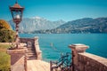 Panorama landscape on beatiful Lake Como in Tremezzina, Lombardy, Italy. Scenic small town with traditional houses and clear blue