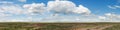 Panorama. Landscape. Clouds over the steppe. Tyva. Steppe. Sunny summer day Royalty Free Stock Photo