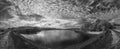 Panorama landscape in infrared of lake in English countryside in