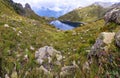 Panorama landscape with a lake in the mountains, huge rocks and