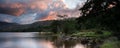 Panorama landscape stunning sunrise over lake with mountain rang Royalty Free Stock Photo