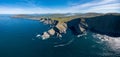 Panorama landscape view of the Kerry Cliffs and Iveragh Peninsula in County Kerry of Ireland Royalty Free Stock Photo