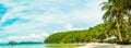 Panorama landscape view ocean beautiful with umbrella, lounge on the beach and palm or coconut tree chairs at Island of sea in Royalty Free Stock Photo