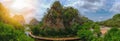 Panorama landscape view of the rocky mountains. the sunset light shining trees and swamps. there are beautiful sky and clouds.