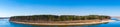 Panorama of a large island on a background of blue cloudless sky. Bright sunny day. Kitoy River, Irkutsk Region, Russia Royalty Free Stock Photo