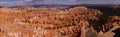 Panorama, late afternoon light colors the sandstone pinnacles