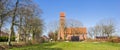 Panorama of the leaning tower of the church in Midwolde