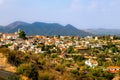 Panorama of Lefkara, traditional Cypriot village with red rooftop houses and mountains in the background, Larnaca district, Cyprus Royalty Free Stock Photo