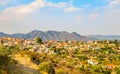 Panorama of Lefkara, traditional Cypriot village with red rooftop houses and mountains in the background, Larnaca district, Cyprus Royalty Free Stock Photo