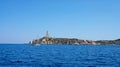 Panorama of the lighthouse in the cabbage islands isola dei cavoli - with sails boat - Cagliari Sardinia