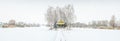 Panorama with little farm house in winter time Royalty Free Stock Photo