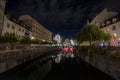 Panorama of Ljubljanica river with the Tromostovje triple most rbidge in Ljubljana, capital city of Slovenia, taken at night Royalty Free Stock Photo