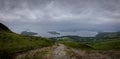 Panorama of Loch Lomond from a high perspective on a cloudy foggy day, is a large and deep lake in the Southern Highlands