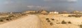 Panorama of a lonesome hunting cabin in wild and secluded desert grasslands