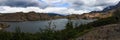 Panorama looking over Lago Grey with the snow capped Andes of Torres Del Paine in the background Royalty Free Stock Photo