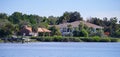 Panorama of Luxury beach house with boat dock Royalty Free Stock Photo