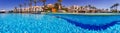 Panorama of a luxury tropical resort with large swimming pools