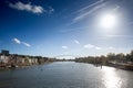Panorama of the Maastricht Waterfront on the Meuse Maas river with a focus on the hoge brug bridge, in autumn, during a sunny Royalty Free Stock Photo