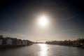 Panorama of the Maastricht Waterfront on the Meuse Maas river with a focus on the hoge brug bridge, in autumn, on a sunny sunset. Royalty Free Stock Photo