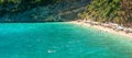 Panorama of Makris Gialos beach in Zakynthos in Greece. People enjoying vacations.