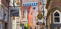 Panorama of many signs in the narow street of Schnoor neighbourhood in Bremen Royalty Free Stock Photo