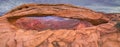 Panorama of Mesa Arch on a cloudy day, Canyon Lands National Park, USA