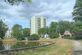 Panorama of modern city with park and lake. Lake in city park. City life