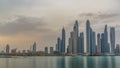 Panorama of modern skyscrapers in Dubai city at sunrise from the Palm Jumeirah Island. Royalty Free Stock Photo