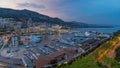 Panorama of Monte Carlo day to night timelapse from the observation deck in the village of Monaco with Port Hercules Royalty Free Stock Photo