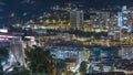 Panorama of Monte Carlo timelapse at night from the observation deck in the village of Monaco near Port Hercules. Royalty Free Stock Photo