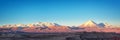 Panorama of Moon Valley in Atacama desert at sunset, snowy Andes mountain range in the background Chile Royalty Free Stock Photo