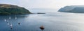 Boats moored at Portree harbor in Skye, Scotland