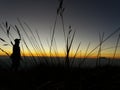 Silhouette photo at sunrise on Mount Merbabu