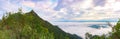 Panorama of mountain forest with white clouds or fog at sunrise time with cloud scape at `LerGuaDa` Tak province, Thailand, Asia. Royalty Free Stock Photo