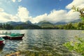 Landscape of the picturesque lake surrounded by mountain peaks and canyons Royalty Free Stock Photo