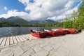 View of the Panorama mountain lake Strbske Pleso in the Tatra mountains. Summers colors and boat for swimming Royalty Free Stock Photo