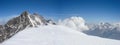 Panorama mountain landscape in the Swiss Alps near Zermatt on a beautiful day in late winter under a blue sky Royalty Free Stock Photo