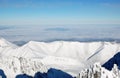 Panorama of mountain peaks in the High Tatras in winter from Lomnicky Peak. Royalty Free Stock Photo