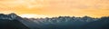 Panorama of Mountain peaks landscape at sunset Royalty Free Stock Photo