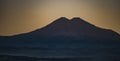 Panorama of the mountain range of the Caucasus Mountains at sunset Royalty Free Stock Photo